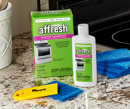 affresh cooking cleaning kit contains cleaner, pad and scraper safe for glass stoves.