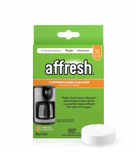 A close-up of the 4-count package of affresh® coffee maker cleaner tablets designed to clean and descale coffee machines with a single tablet in front.