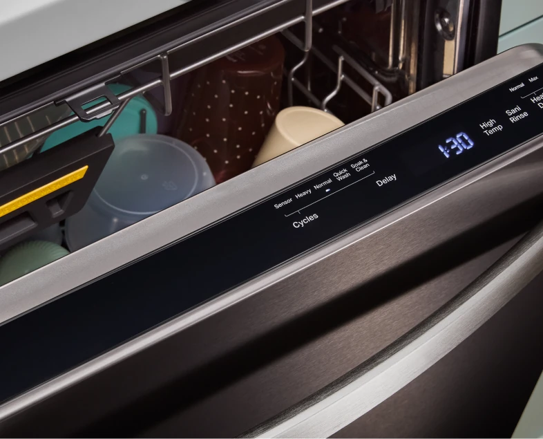 Dishwasher control panel showing cycle options and a 1:30 delay start time